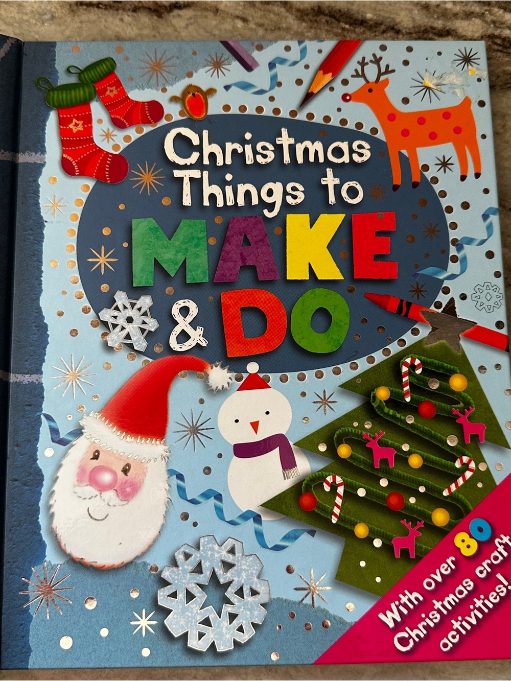 Igloo Blue Holiday Craft Book Cover with Multicolor Accents
